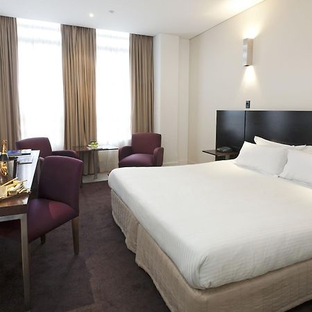 Hotel Causeway Melbourne Room photo